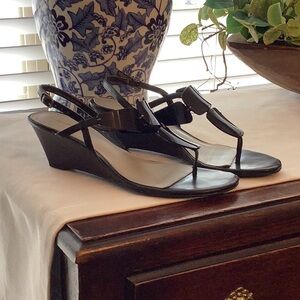 Black wedge sandals.